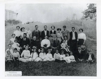 The Adair family at the Adair family farm south of Potlatch. Top row (left to right): Matilda Adair Gray, Stella Hawkins Adair holding Rita, Edgar Adair, Roy Smith, Ellen Clyde Smith, Itha Adair Caldwell, John Adair, Bud Adair, Ina Cox Adair. 2nd Row: Mary Lee Adair Clyde holding Pearl, Pete Clyde, Caroline Berry Scallions, Martha Scallions Adair, Frances Marion Adair, Clara Adair Hawkings holding Chancey H. 3rd Row: Joe Clyde holding Rita Adair, Rob Adair, Bertha Cycle, Lois Gray, Goldie Clyde, Vera Caldwell, Neva Hawkins, Irene Smith, Leslie Smith, Leola Adair, Lyle Gray.