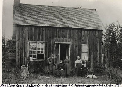 Mr. and Mrs. J. R. Strong on their homestead with Alice (Mrs. Corliss McElroy) and Alva. Photograph taken in April, 1891.