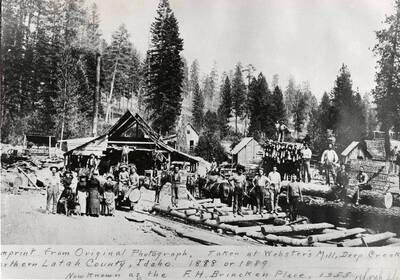 Workers at Webster's Mill, Deep Creek, Northern Latah County, Idaho. The location is known as the F. H. Brincken Place in 1955. Imprint made from an original photograph taken in 1888 or 1889.