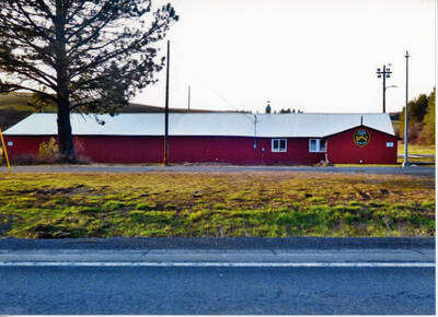 Photograph of the Troy Deary Gun Club (building formerly owned by the Potlatch Lumber Company).