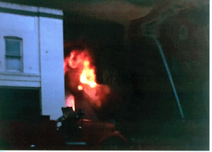 Photograph of the Potlatch Mercantile on fire.