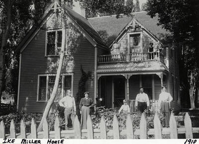 Ike Miller and his family outside the Ike Miller House. Photograph taken in 1910.