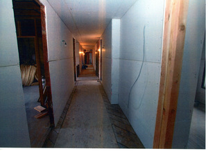 Photograph of sheetrock installed in the hallway of the 2nd floor of the WI&M Depot.