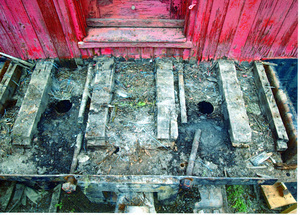 Photograph of the condition of the Caboose X-5 prior to restoration.