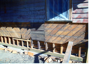 Photograph of the beginning of the restoration of the Annex Building at the WI&M Depot.