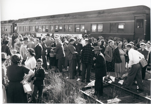 Photograph of a crowd of people waiting to board the train for the 50th Anniversary Special.