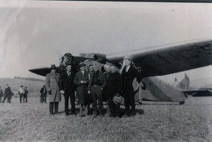 Photograph of officials of the Potlatch Lumber Company, Clearwater Timber Company, and the State of Idaho ready to fly over timber.