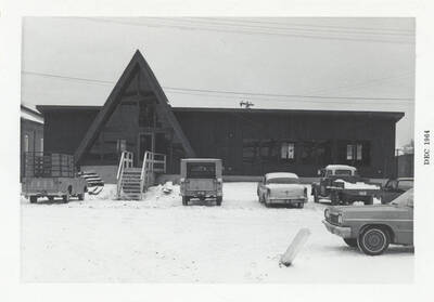 A view of the tent shaped building from the parking lot.