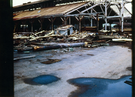 Photograph of beginning to dismantle the green chain at the Potlatch Mill.