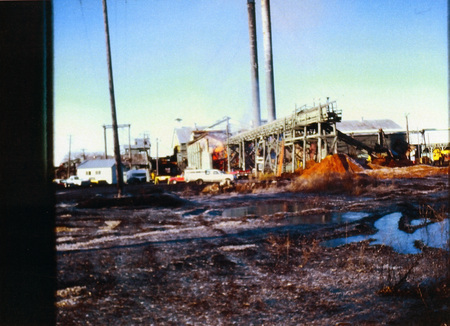 Photograph of buildings at the Potlatch Mill during demolition.