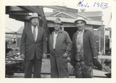 Three men of what appears to be different professions.