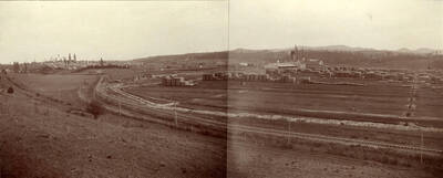 A view of Potlatch, the lumber yard, and train tracks.
