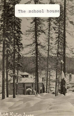 A photograph of the school house in Elk River, ID.