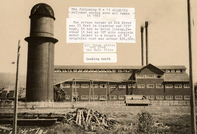 An 8x11 photograph looking north at the refuse burner at Elk River with a description of its 33 foot diameter, and 123 foot height. It did not have a brick lining, but it did have an 18' wide complete water jacket 72 feet high. It had an original cost of about $26,000