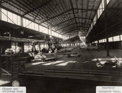 A photograph of the planer and shipping dock at the Elk River Mill.