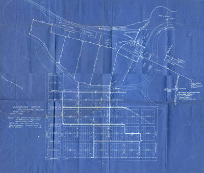 A blueprint of Elk River, Idaho's water work system. It displays all the tanks and fire wood stove pipe (1 1/2' by 2' iron pipe) along with fire hydrants and gate valves.