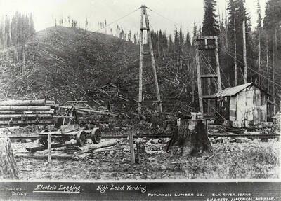 A photograph for high lead yarding at Potlatch Lumber Company's Elk River Camp. Used for electric logging with E.J. Barry as the electrical engineer.