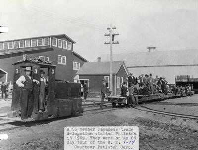 A photograph of a 55 member Japanese trade delegation that visited Potlatch during their 80 day tour of the U.S.