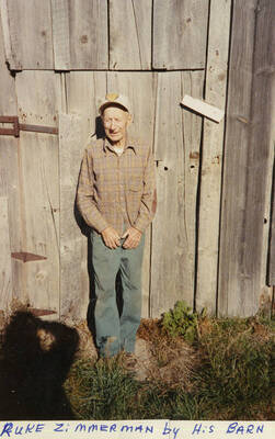 Ruke Zimmerman by his barn.