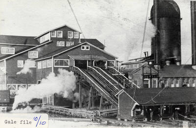 A photograph of the log slip at the sawmill.