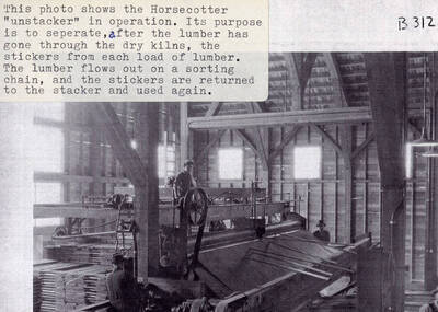 A photograph of the Horsecotter 'unstacker' in operation. It separated the stickers from each load of lumber and returned them to be used again.