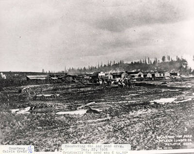 A photograph of workers excavating the log pond area when it was originally 6 to 10 feet. Photo courtesy of Calvin Kreid.