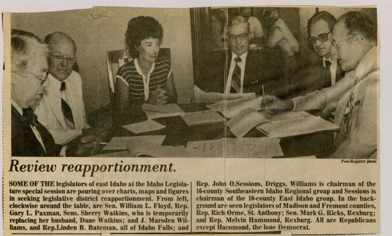 A newspaper article discussing: A picture of Idaho legislators with the caption: "SOME OF THE legislators of east Idaho at the Idaho Legislature special session are pouring over charts, maps and figures in seeking legislative district reapportionment. From left, clockwise around the table, are Sen. William L. Floyd, Rep. Gary L. Paxman, Sens. Sherry Watkins, who is temporarily replacing her husband, Dane Watkins; and J. Marsden Williams, and Rep.Linden B. Bateman, all of Idaho Falls; and Rep. John O.Sessions, Driggs. Williams is chairman of the 16-county Southeastern Idaho Regional group and Sessions is chairman of the 10-county East Idaho group. In the background are seen legislators of Madison and Fremont counties, Rep. Rich Orme, St. Anthony; Sen. Mark G. Ricks, Rexburg; and Rep. Melvin Hammond, Rexburg. All are Republicans except Hammond, the lone Democrat."