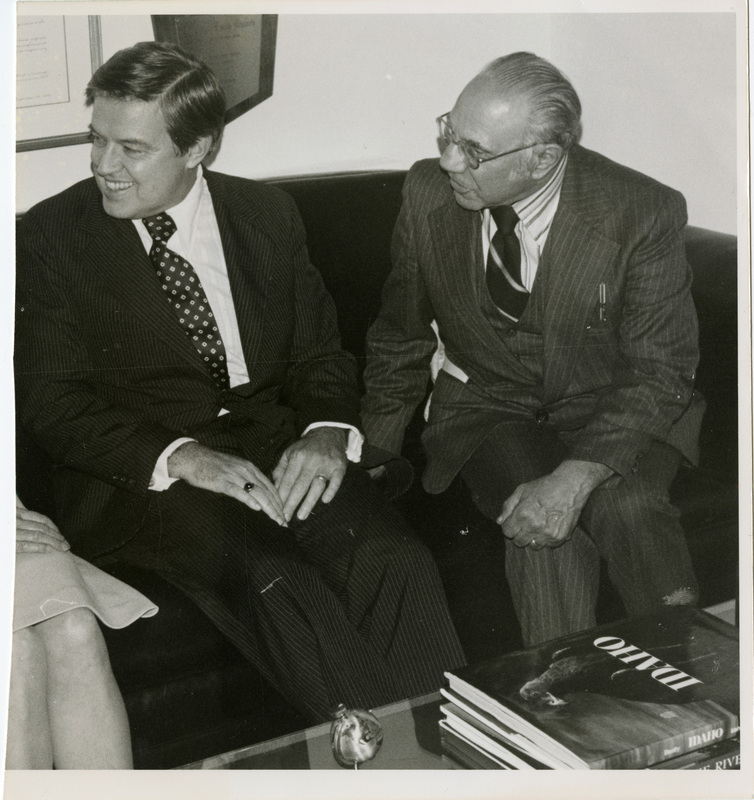 Photo where two men looking are to the left and talking. Text back translation "Senator Frank Church Idaho Falls Post Register Executive Editor Ben J. Plastino"