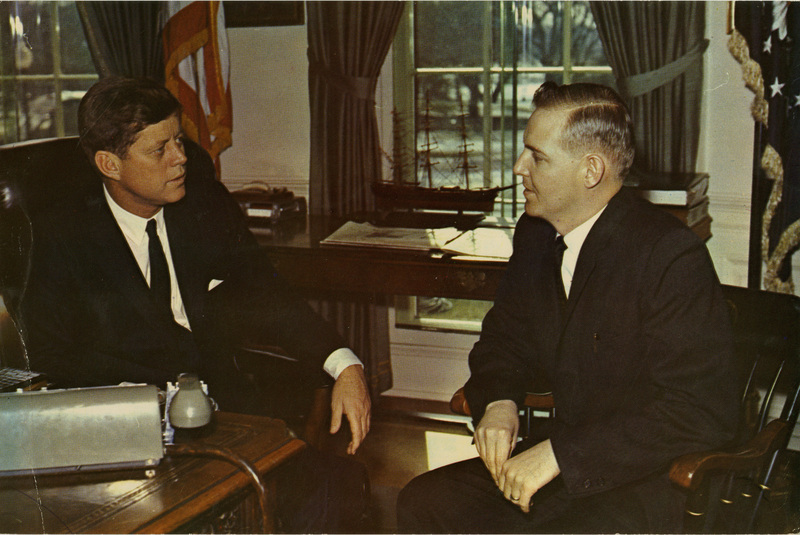Photo Description: President John F. Kennedy and 2nd District Idaho Congressman Ralph Harding (D) are caught up in conversation in an office.