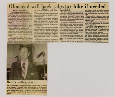 A newspaper article discussing: House Speaker Ralph Olmstead opposes a sales tax hike but supports shifting school funding away from property taxes, favoring cuts to state programs. He backs tax relief for property taxes and senior citizens, as well as increased highway funding and potential school district consolidation. Olmstead, re-elected in November, is expected to easily retain his position despite competition.