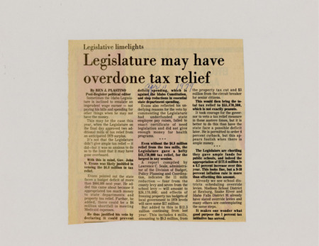 A newspaper article detailing Governor Evans veto of a tax relief bill. The veto was for potential negative impact on the deficit. Plastino questions the 1% tax initiative's purpose if they're just going to give it away.