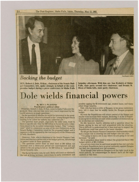 A newspaper article detailing Kansas Senator Robert Dole's trip to Idaho and his answers to questions concerning financial policy in the federal government. His main concern was reducing the deficit. Image labeled "Backing the budget."