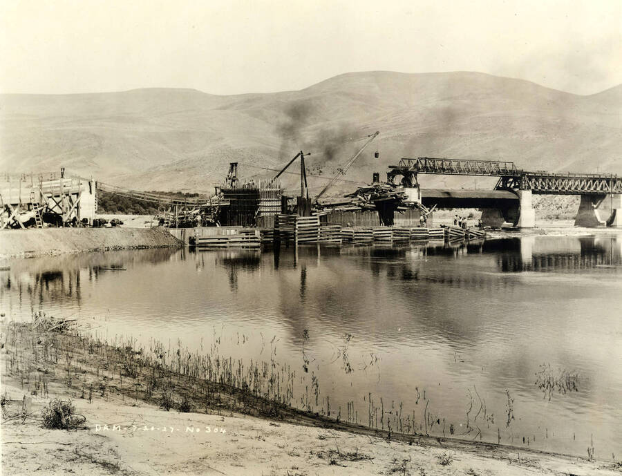 Construction of the Lewiston Dam on the Clearwater river. Written on the photograph is Dam - 7/20/1927 - No. 304.