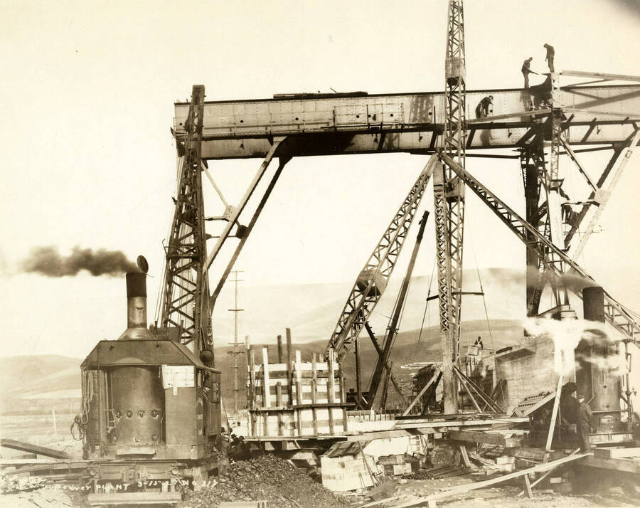 Men work on the construction of the power plant at he Lewiston Mill. Written on the photograph is 'Power Plant, 3/15/1927 No. 217.'