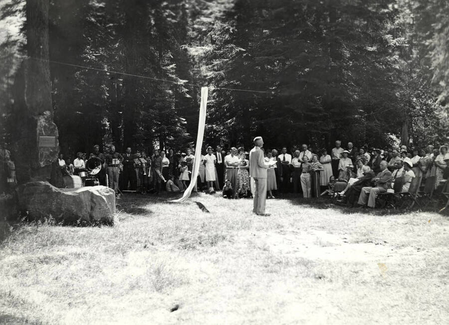H. L. Peterson speaks at the dedication of Laird Park. The description on the back of the photograph reads "Dedication of Laird Park. August 21, 1937. H. L. Peterson speaking."