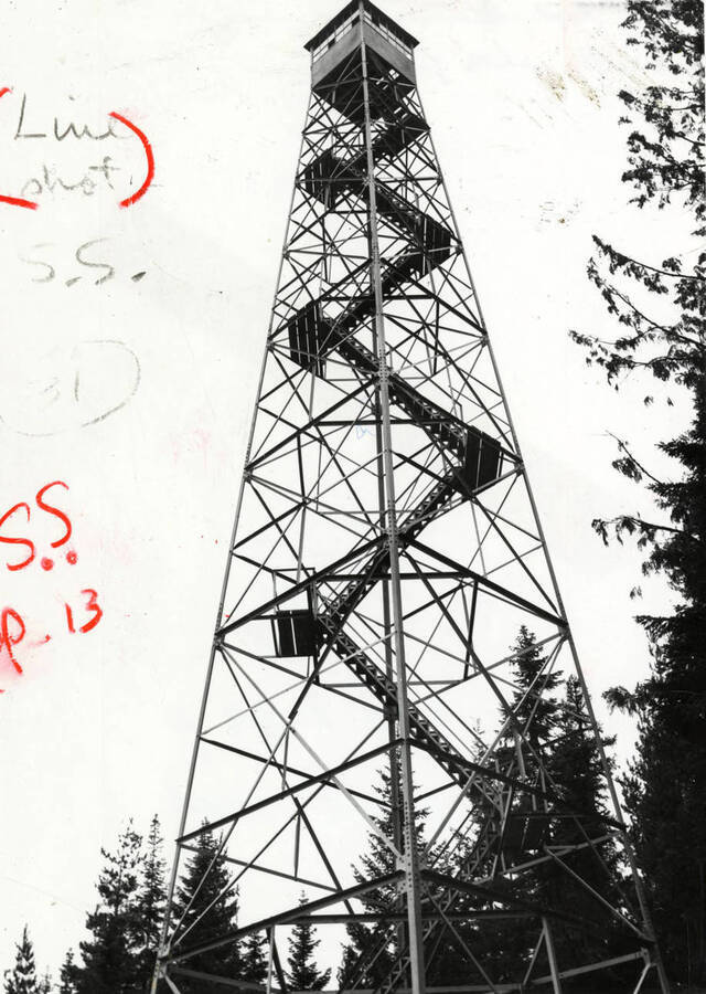 The description on the back reads "100' high Browns Cr lookout. AB Curtis photo file." Metal fire watch tower.