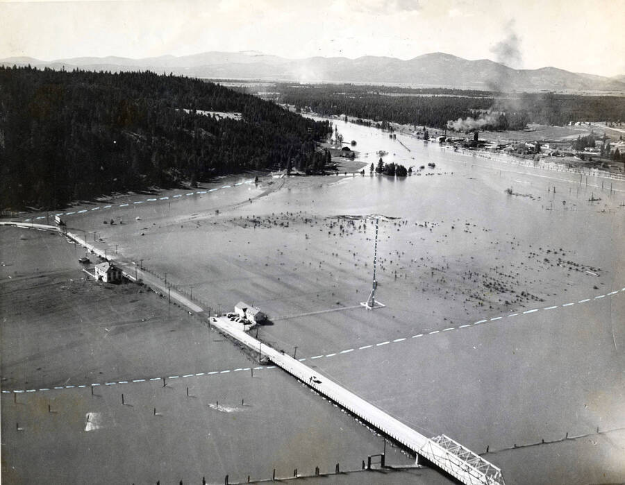An aerial photograph taken of the flooding in 1948. "John Moxson, Emerson Flying Service" is written on the back of the photograph.