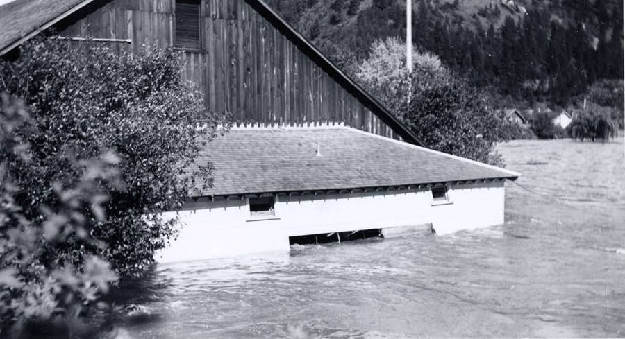 Water rises up one of the Potlatch Mill buildings.