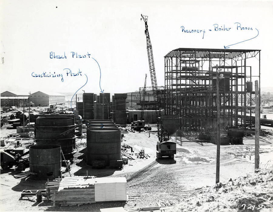 Construction of three different plants at the Clearwater paper mill plant. The three buildings under construction are the Causticizing Plant, the Bleach Plant, and the Recovery and Boiler room.