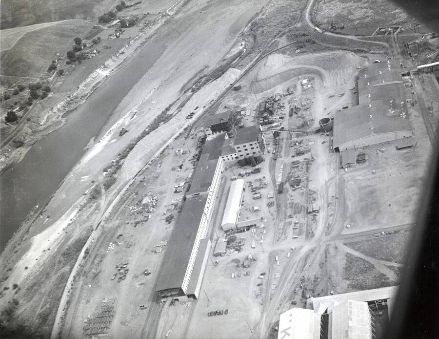 Aerial photograph of the completed Clearwater paper mill. The Clearwater river appears on the left-hand side of the photograph.