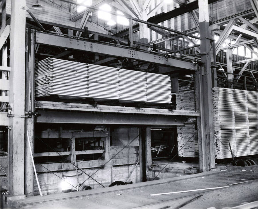 The description on the back of the photograph says "lumber, ready for dry kiln."