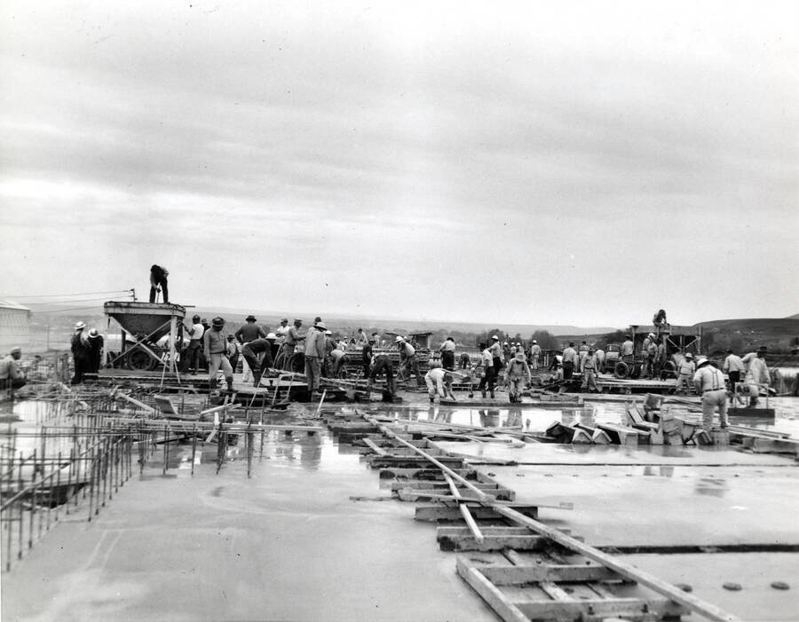 Men work to construction of the roof at the Clearwater paper mill plant