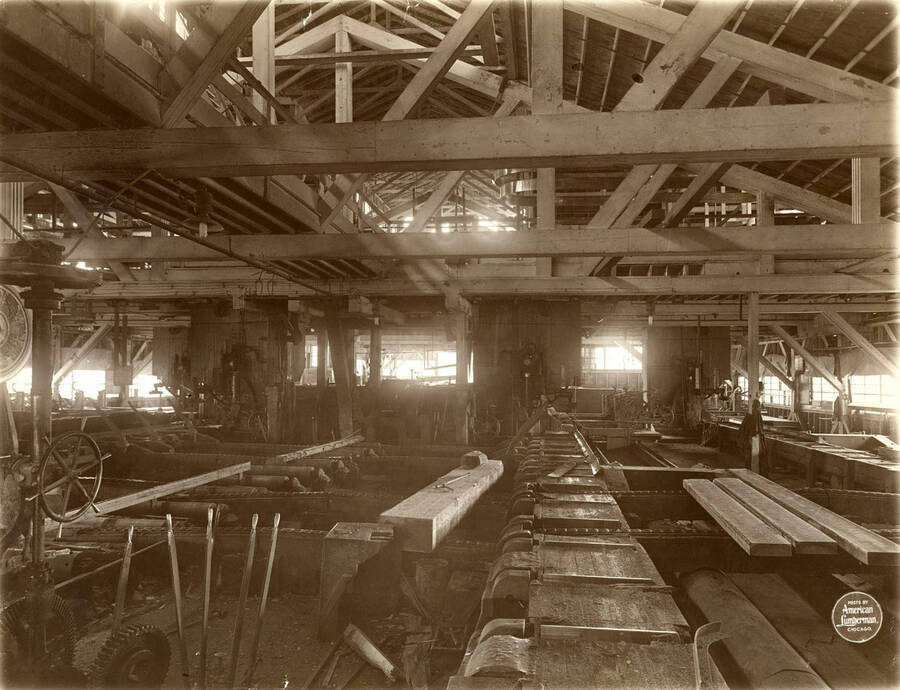 Detail of interior of the saw mill from Center, showing four band mills, but only small part of gang.' (Description taken from American Lumberman papers found within the folder) Photograph taken between September 28 and October 4.