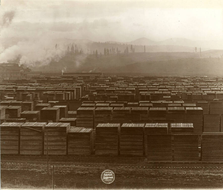 Plate 2 of a five plate set of a panoramic view of the plant over the lumber yard from the north. (Description taken from American Lumberman papers found within the folder) Photograph taken between September 28 and October 4.