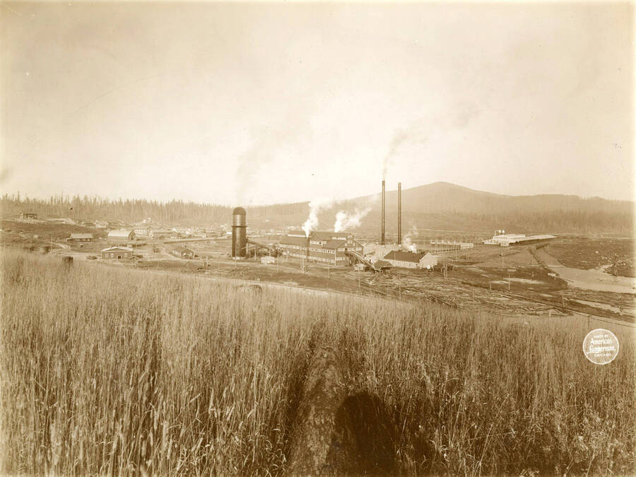 Another view from same position, with wide angle, showing all of the town and plant. Description taken from American Lumberman papers found within the folder. Photograph taken between September 28 and October 4.