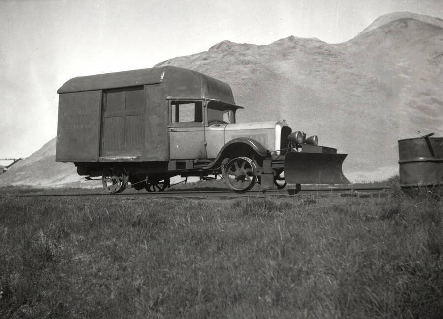A Studebaker passenger car with custom built chassis, used to haul passengers and mail between Palouse and Bovill, 1920?