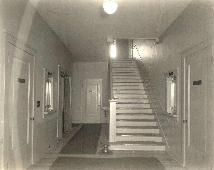 Interior stairway.  Land Department door at rear, Auditing Department at right of photo.