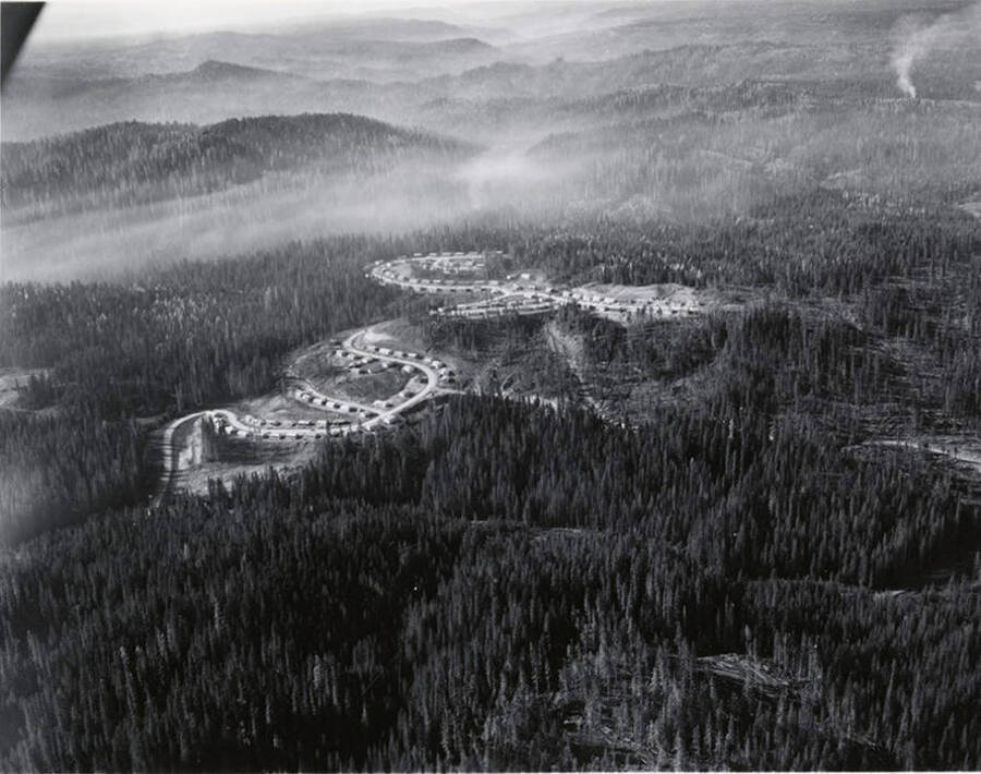 An aerial photo of the Jaype mill at Pierce, Idaho. The mill is surrounded by thick forests.