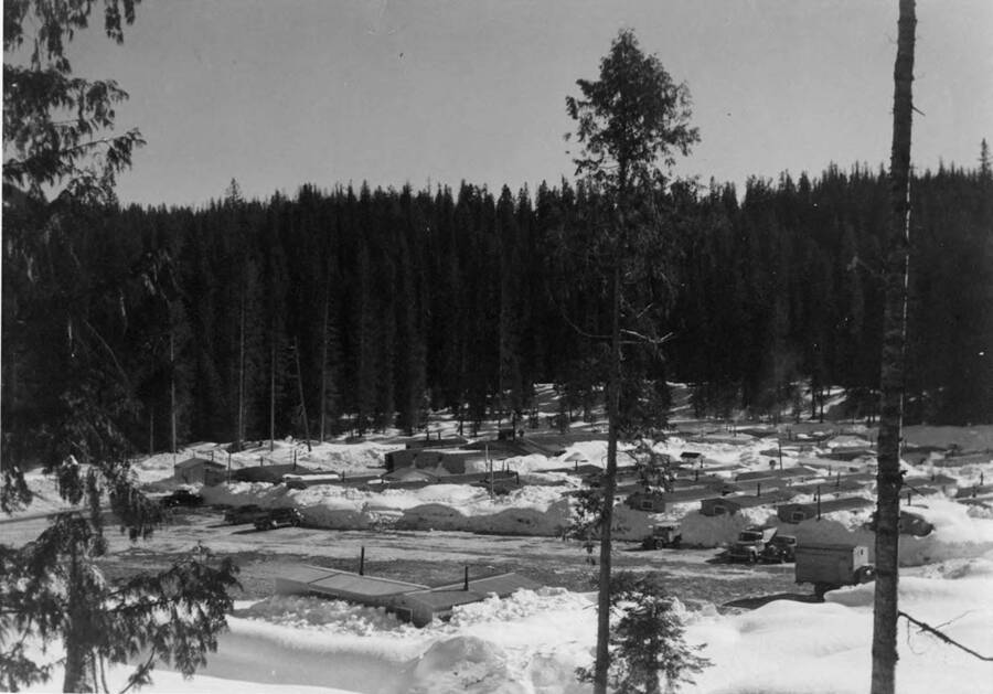 Camp 44 bunkhouses almost buried by snow.