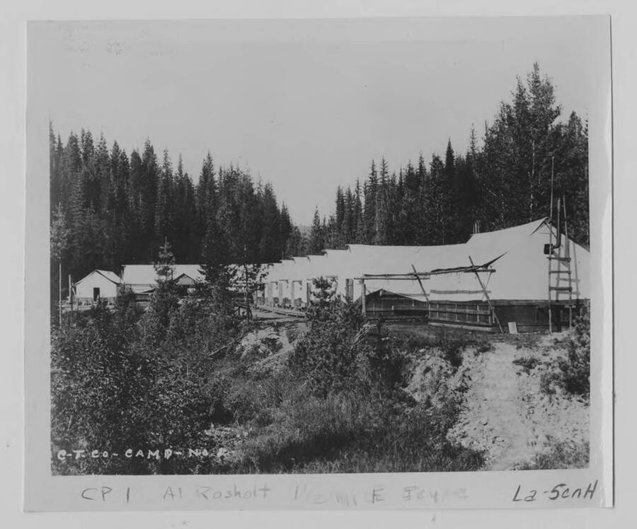The back of the bunkhouses for camp 1. As with being in front of them, an elevated runs behind the bunkhouses to make keeping out of the mud easier.